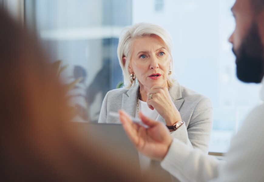 Business people, meeting and cooperation with planning, company merger and negotiation for financia
