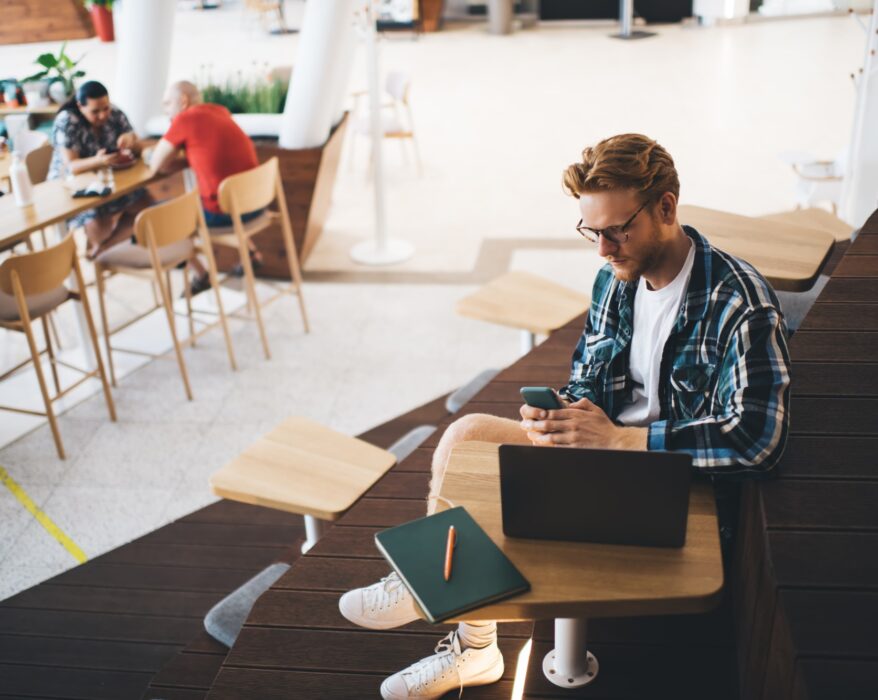 Guy working or studying in coworking office space